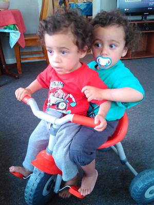 Niu and Vili Malae 'sharing' the bike